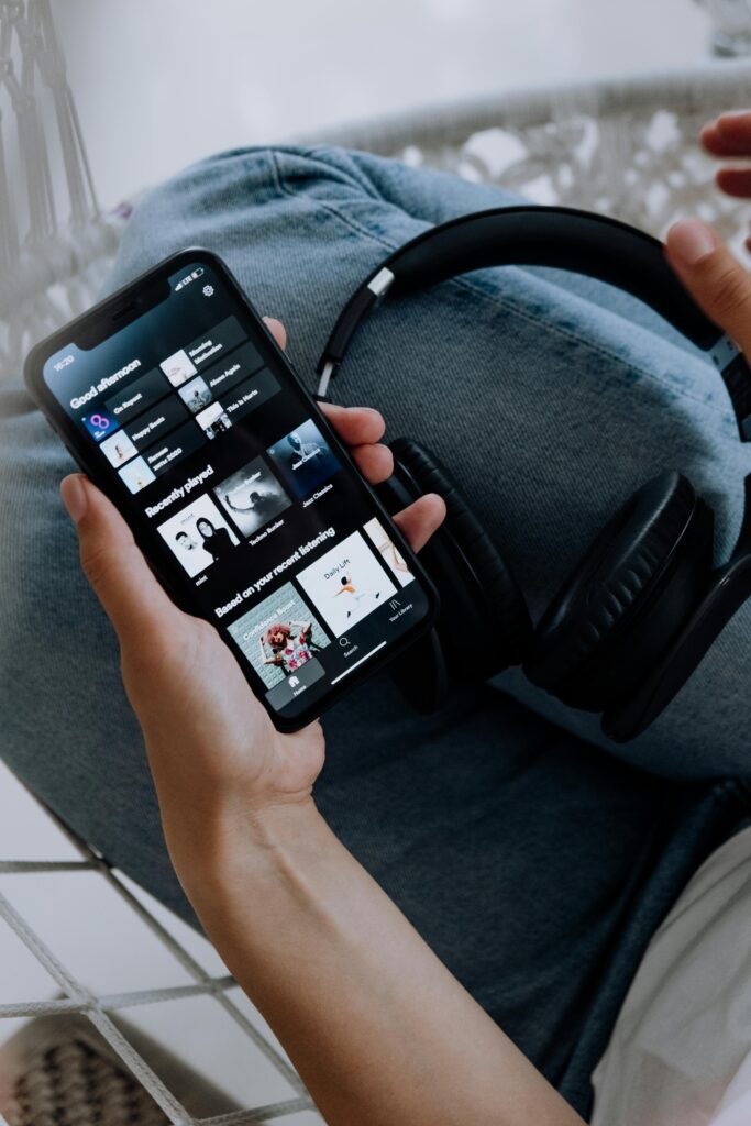 Person using Spotify music app