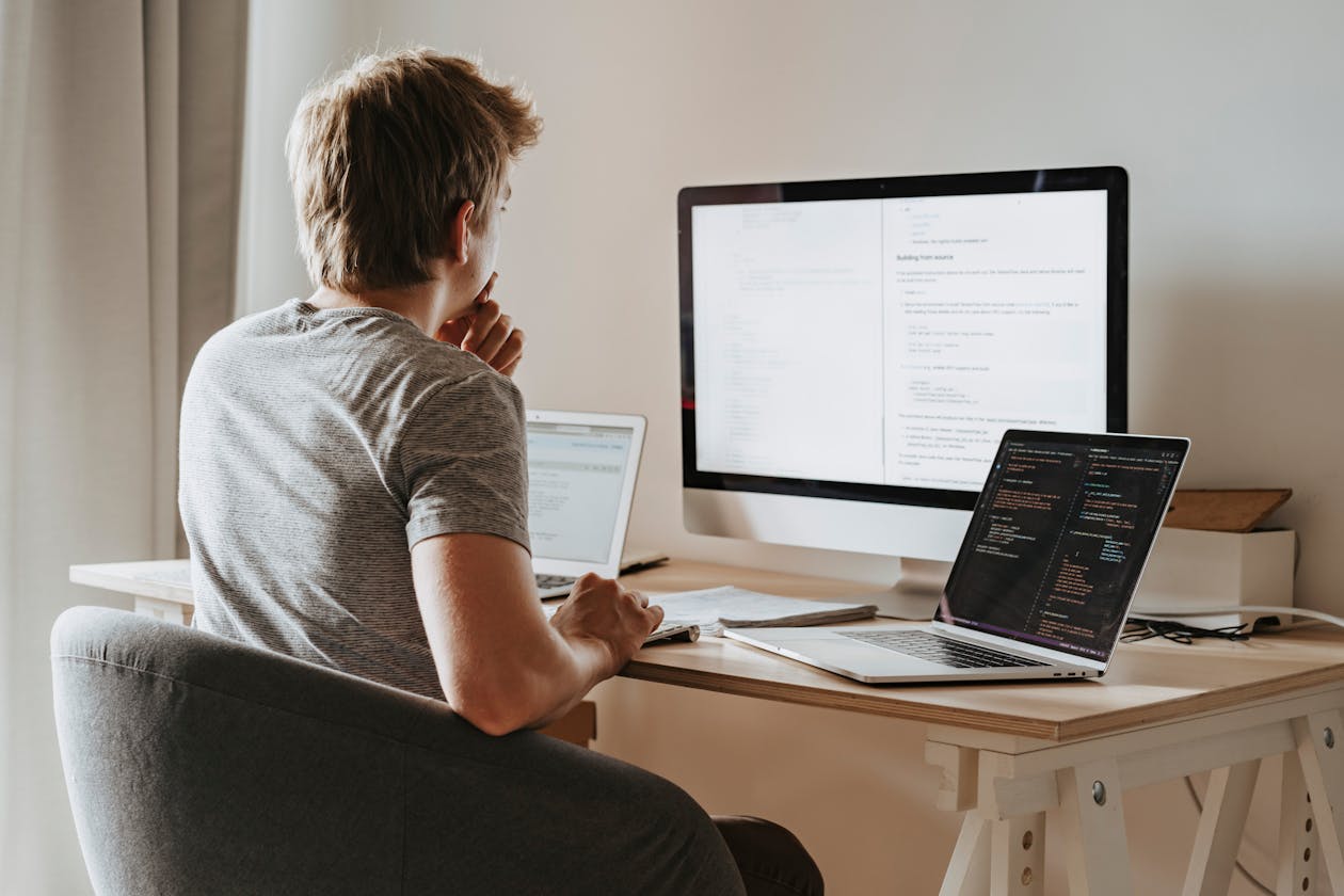 Mobile app developer coding